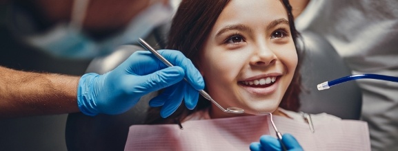 Child smiling during dental visit